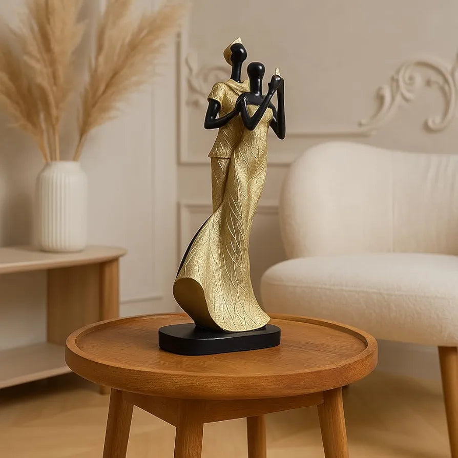 Xtore Lavish Golden Black Resin Couple with Bird for Home Decor