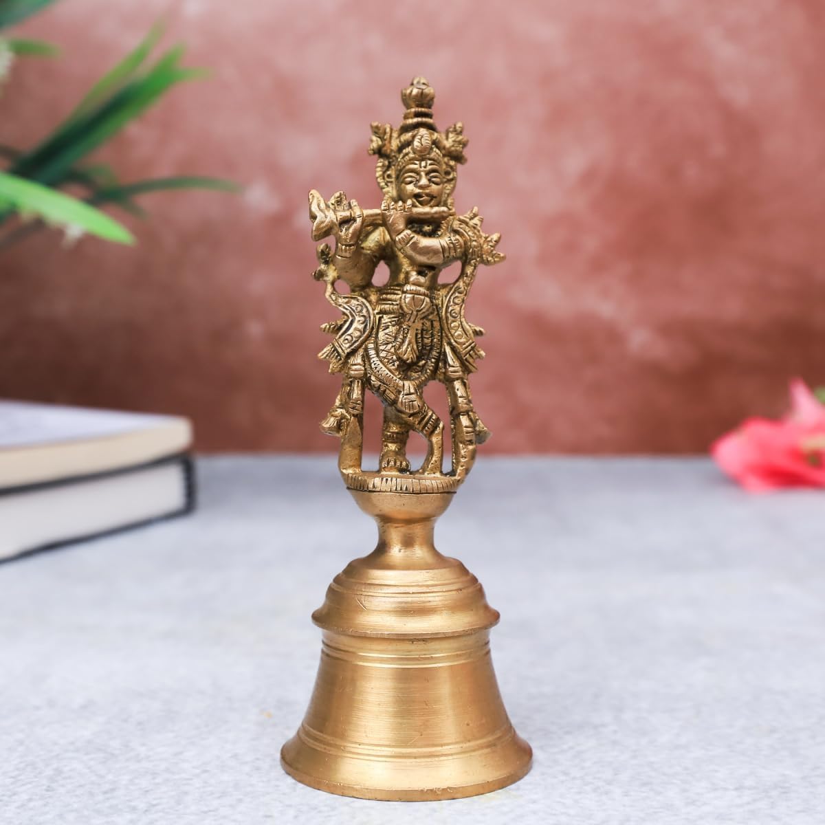 The Advitya Brass Krishan with Flute Standing on Bell