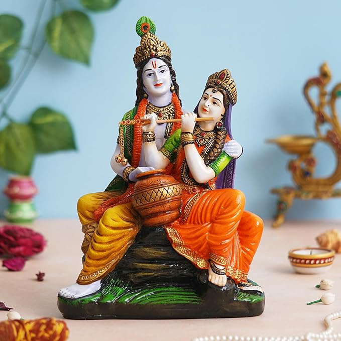 Ecraftindia Multicolor Polyresin Radha Krishna Idol Sitting on Rock Playing Flute and Holding Matki