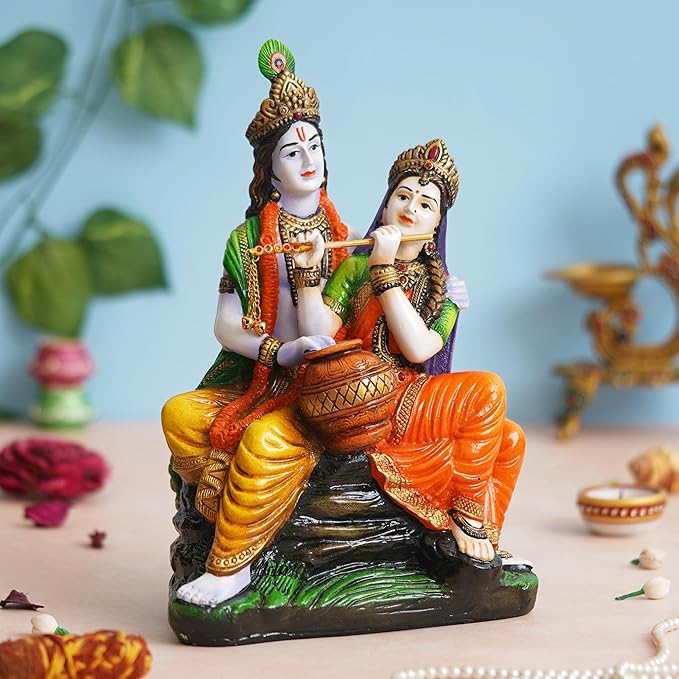 Ecraftindia Multicolor Polyresin Radha Krishna Idol Sitting on Rock Playing Flute and Holding Matki
