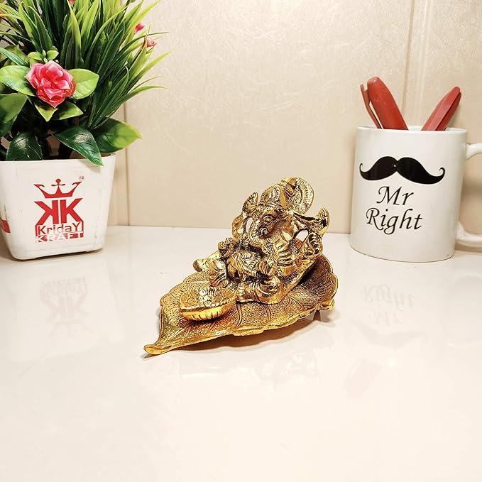 Kridaykraft Metal Lord Ganesha On Leaf with Diya Idol for Pooja Room