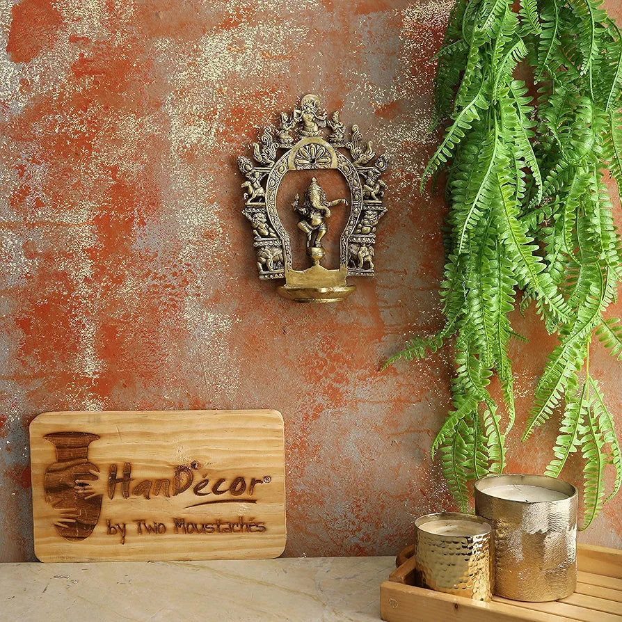 Two Moustaches Brass Ethnic Indian Carving Dancing Ganesha Design Diya with Prabhavali Frame