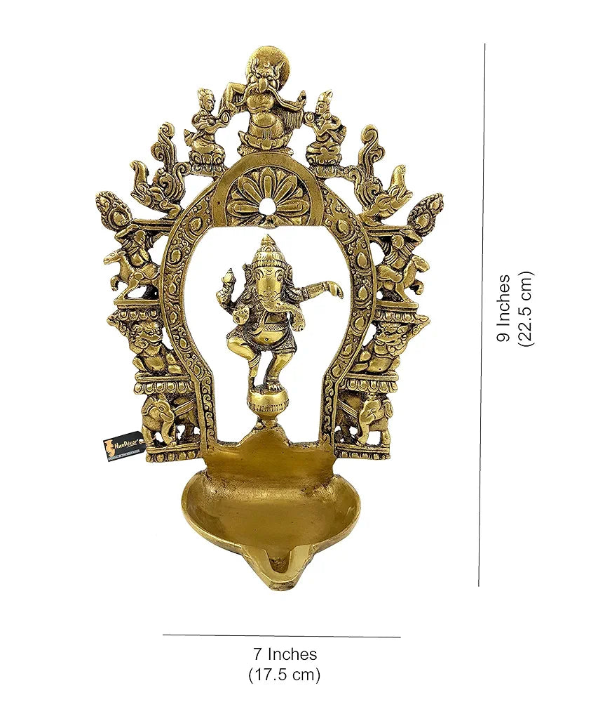 Two Moustaches Brass Ethnic Indian Carving Dancing Ganesha Design Diya with Prabhavali Frame