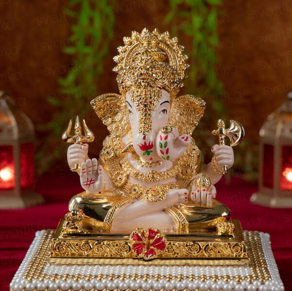 Svastika Dagdusheth ganpati murti with pearl chowki