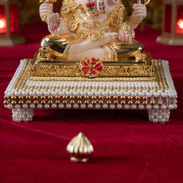 Svastika Dagdusheth ganpati murti with pearl chowki