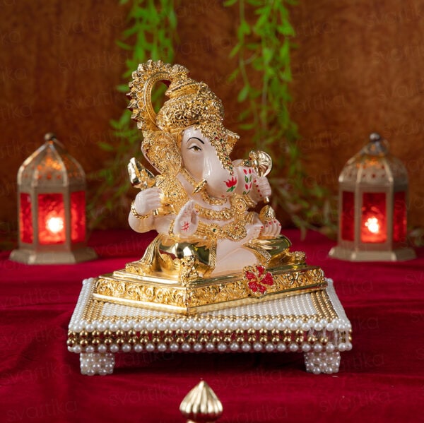 Svastika Dagdusheth ganpati murti with pearl chowki