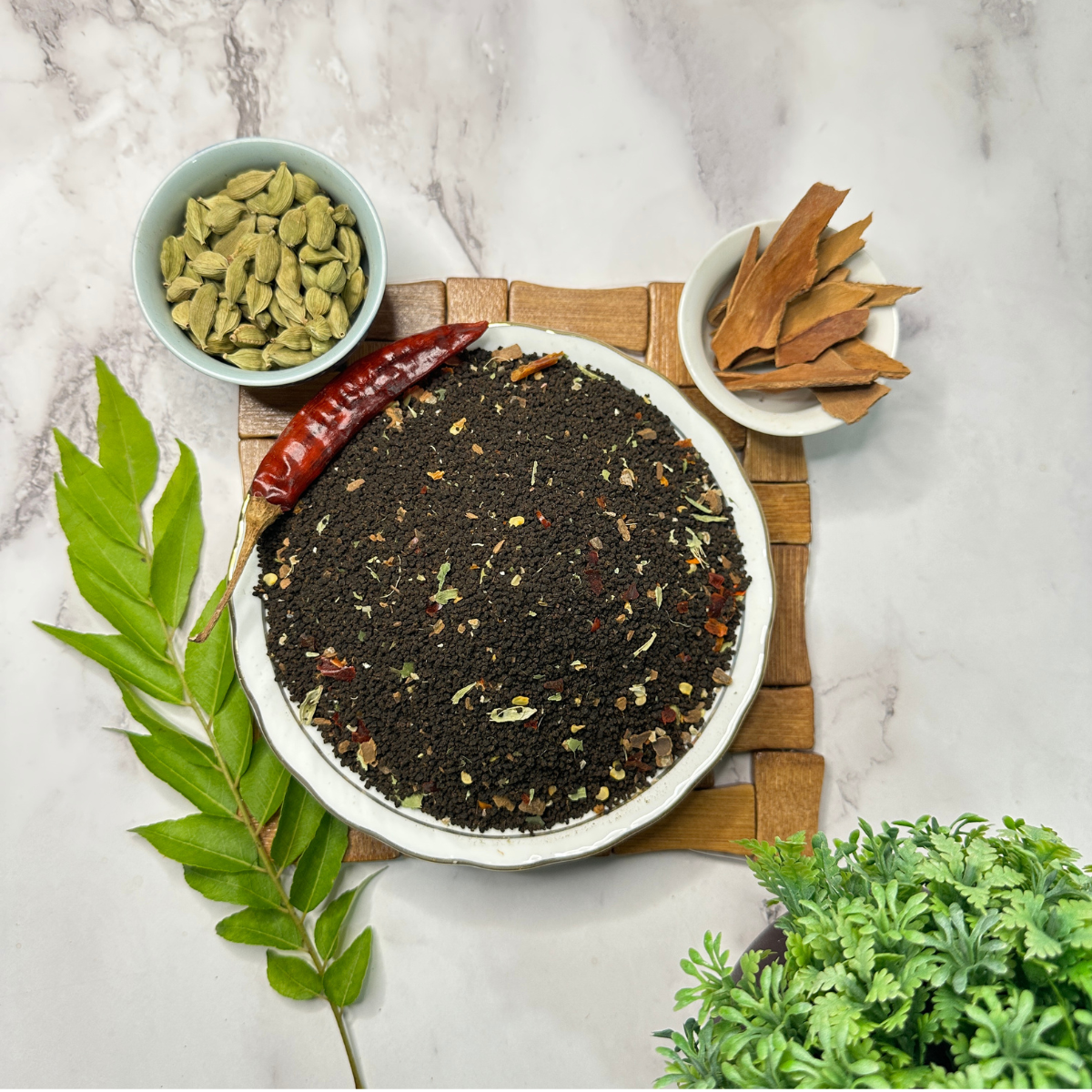 Navvayd Karipatta Chai